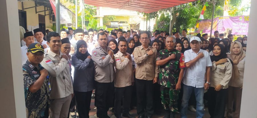 Pelantikan KPPS Desa Pasir Jaya, Sinergi Bhabinkamtibmas dan Babinsa untuk Keamanan Lingkungan